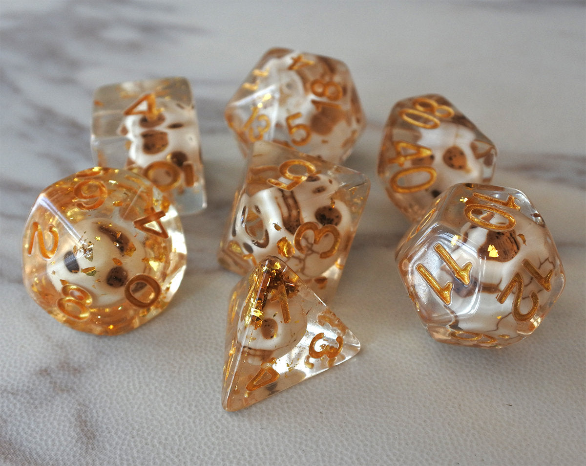 FREE Today: Skulls Laying in Golden Treasure (Give away a random dice set)