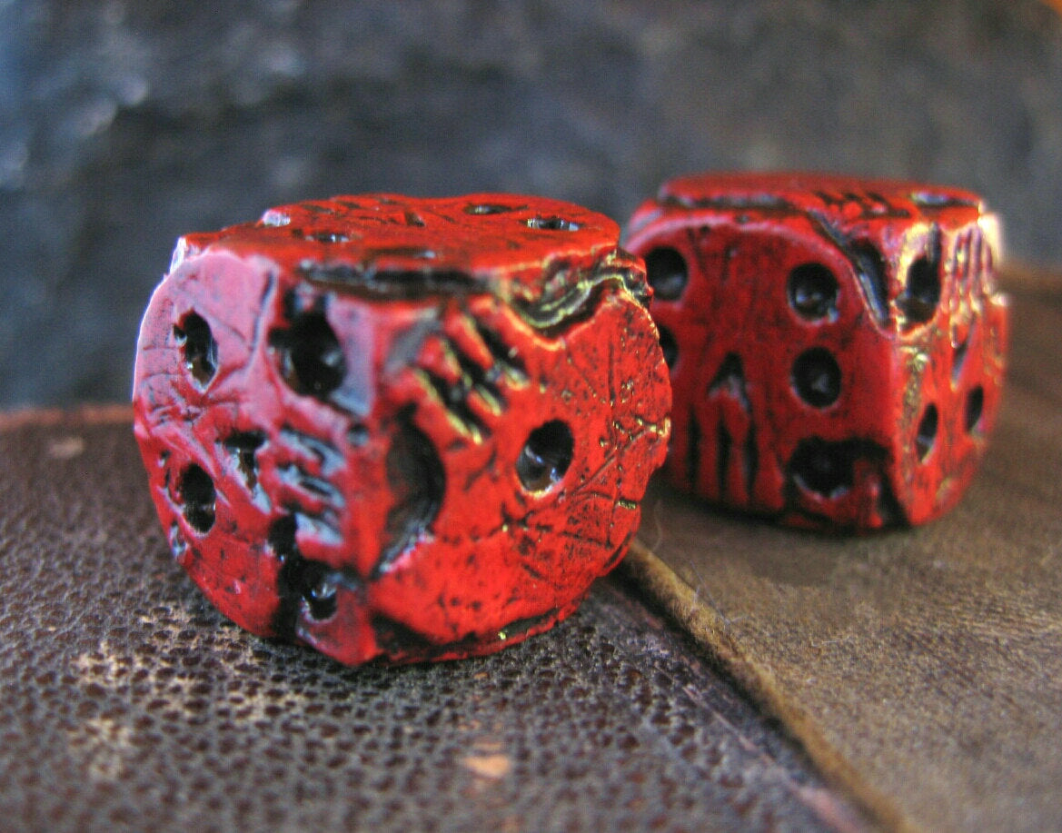 Hand cast red skull dice