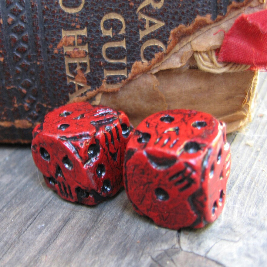 Hand cast red skull dice